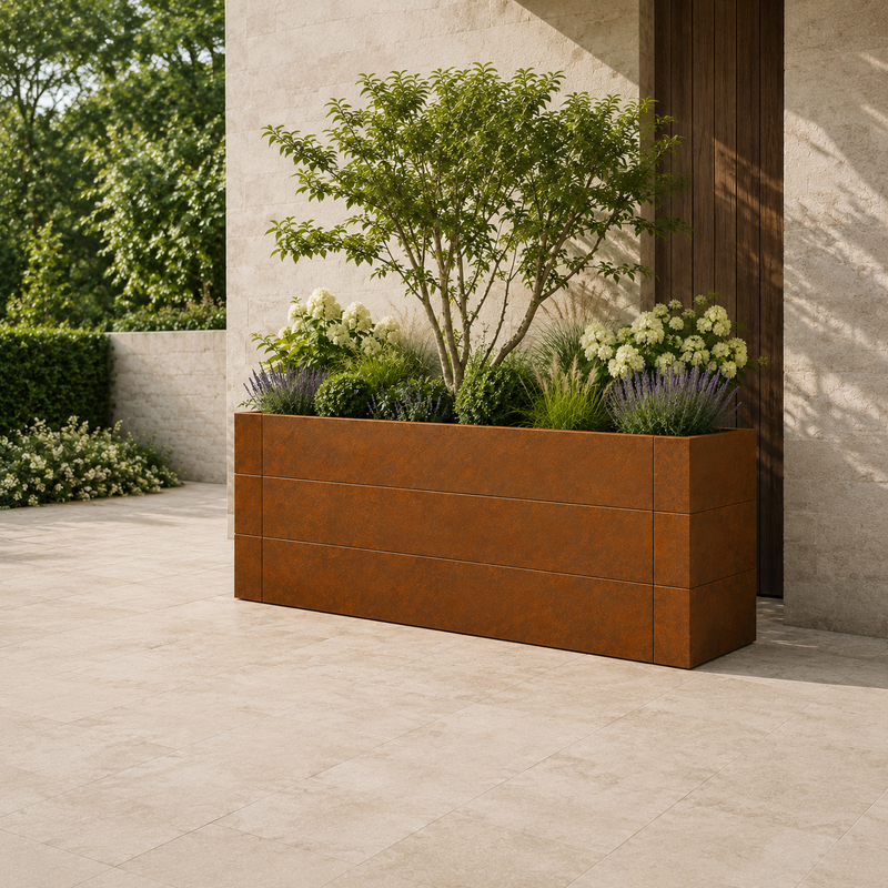 Rusty Corten steel planter at entrance to home.
