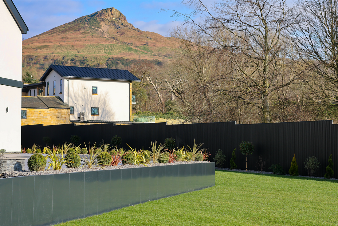 Contemporary garden inspired by Roseberry Topping featuring Anco Retaining Wall steel garden edging and naturalistic planting.